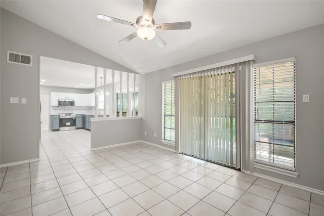 a large white room with windows