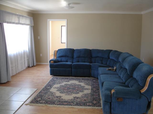 76 Freedom Lane Taylor, AZ 85939 - Photo 2 of 5 a living room with furniture and a couch