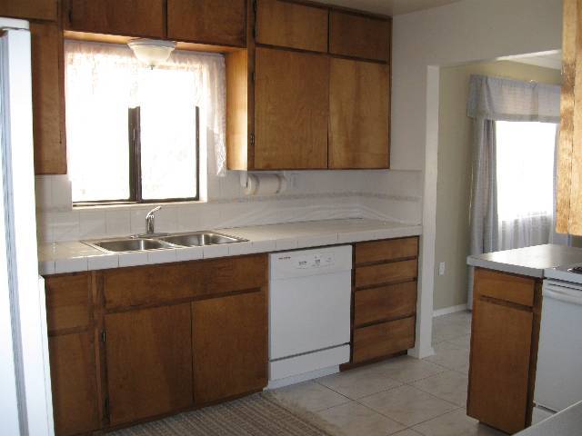 76 Freedom Lane Taylor, AZ 85939 - Photo 4 of 5 a bathroom with a sink vanity and a mirror