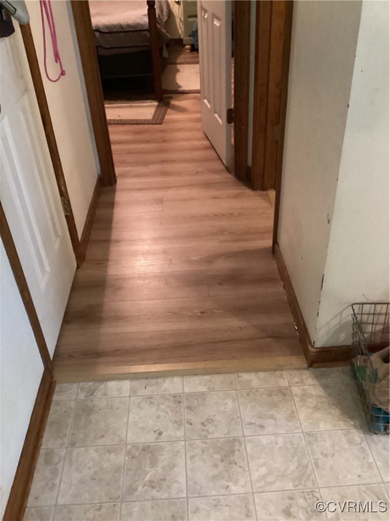 4433 Branchester Parkway Prince George, VA 23875 - Photo 12 of 29 Corridor with light wood-type flooring and baseboa