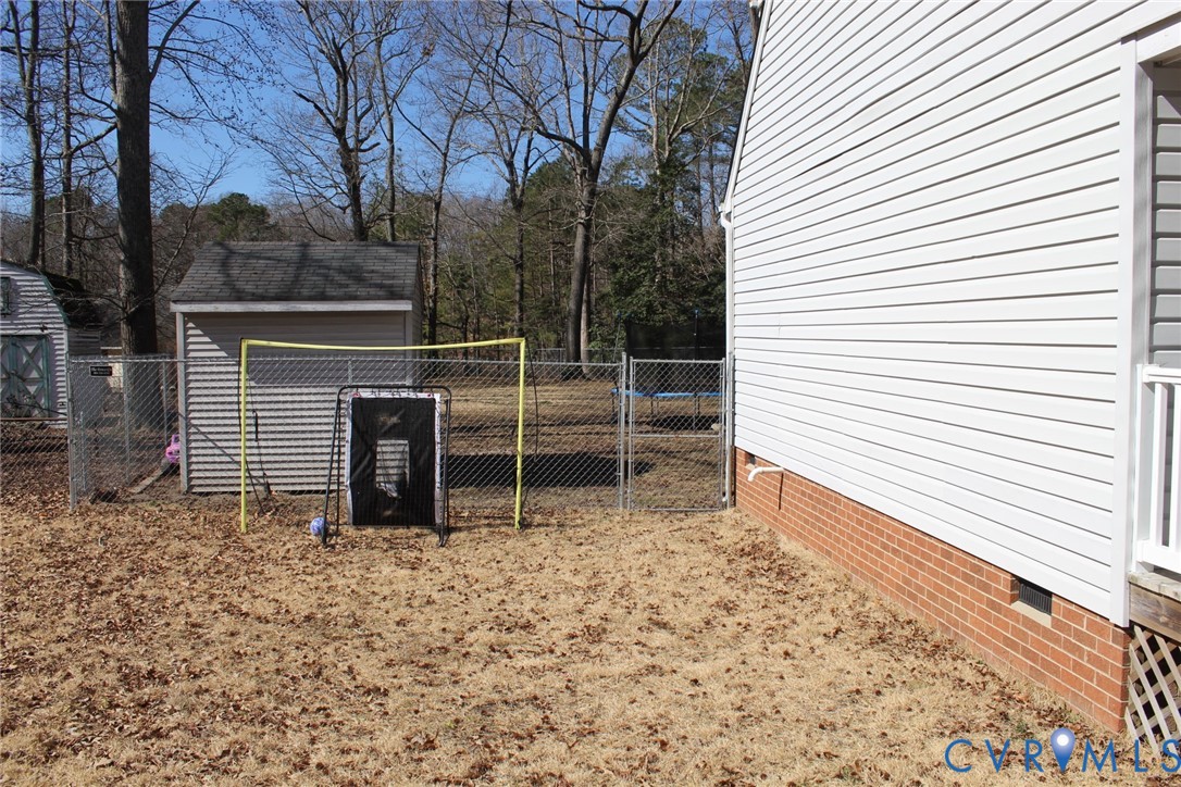 4433 Branchester Parkway Prince George, VA 23875 - Photo 16 of 29 View of yard featuring an outdoor structure