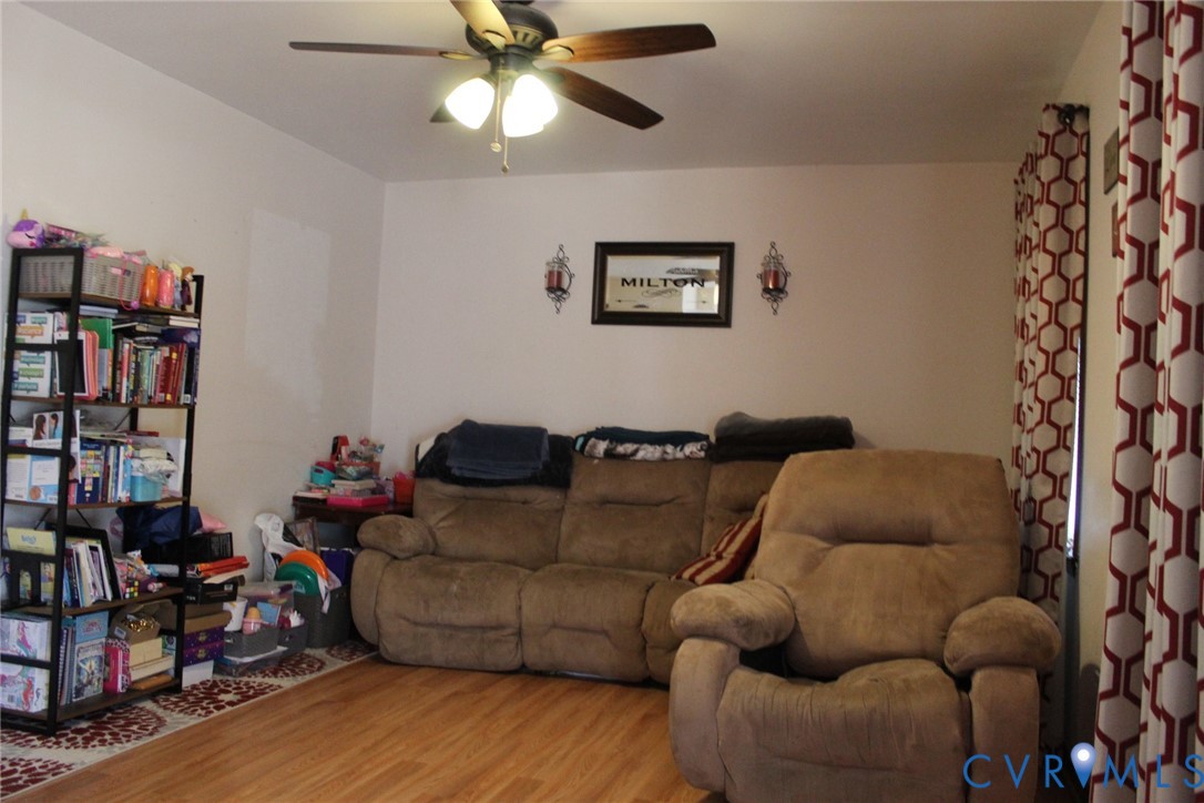 4433 Branchester Parkway Prince George, VA 23875 - Photo 18 of 29 Living room with wood finished floors and a ceilin