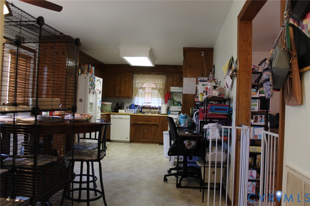 4433 Branchester Parkway Prince George, VA 23875 - Photo 19 of 29 Kitchen with wood finish cabinetry, white applianc