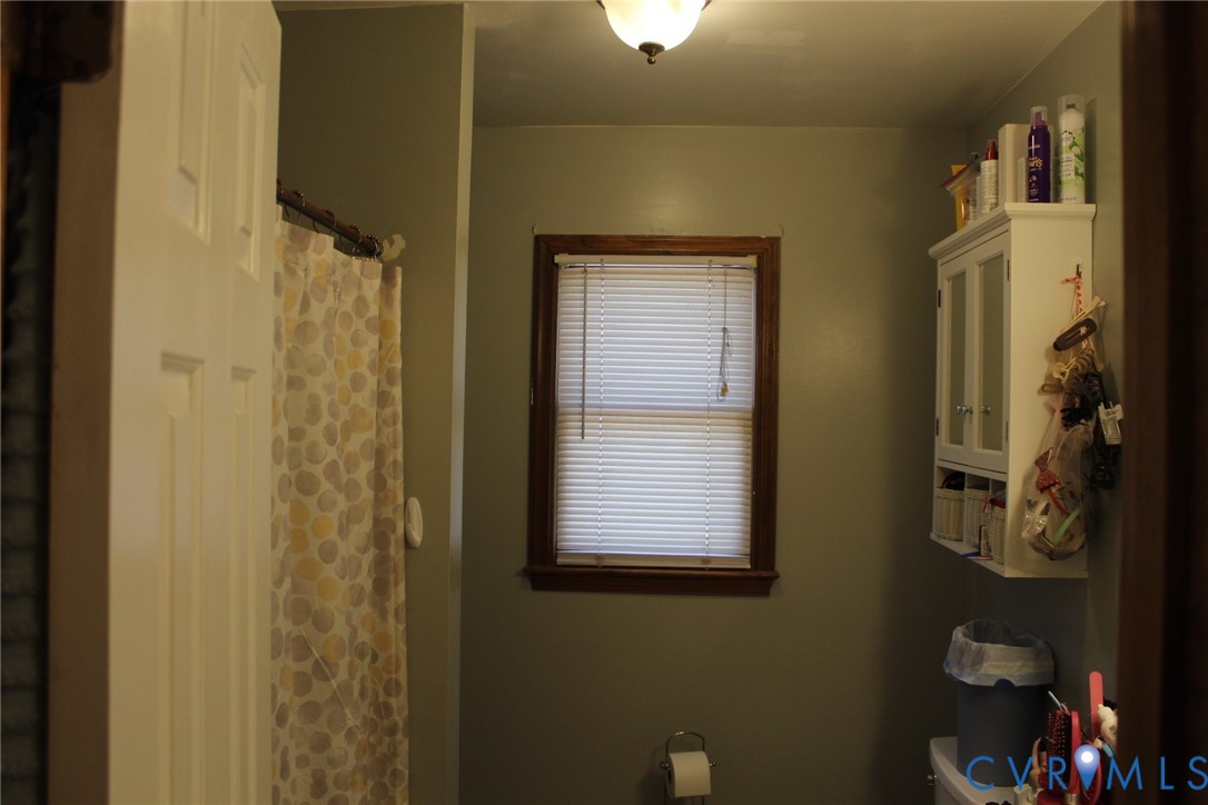4433 Branchester Parkway Prince George, VA 23875 - Photo 20 of 29 Bathroom with toilet and a shower with shower curt