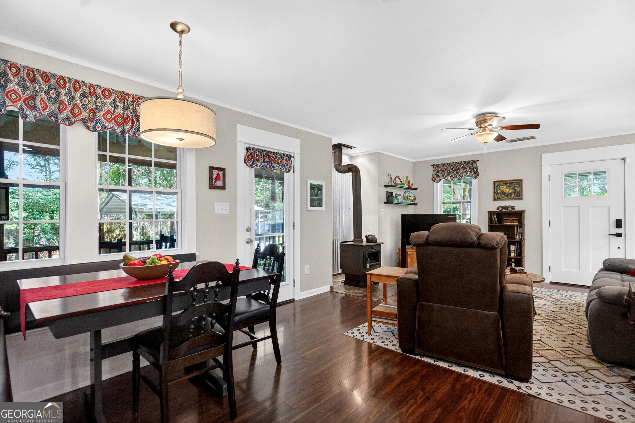 4656 Greenville Road LaGrange, GA 30241 - Photo 11 of 34 a living room with furniture a window and a chandelier