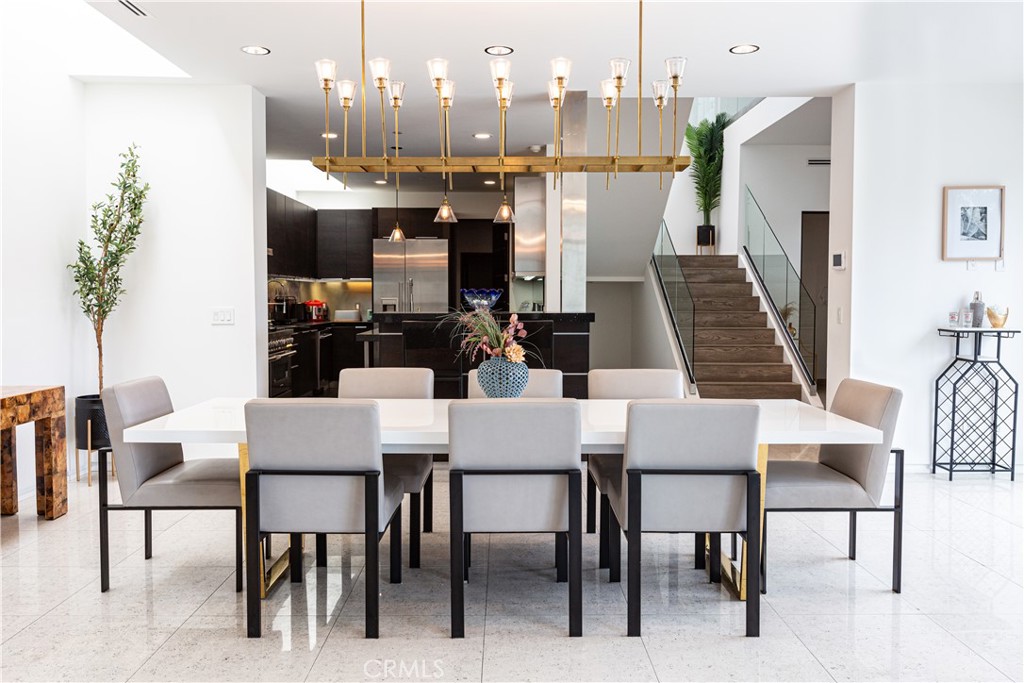 12148 Travis Street Los Angeles, CA 90049 - Photo 13 of 32 a view of a dining room with furniture