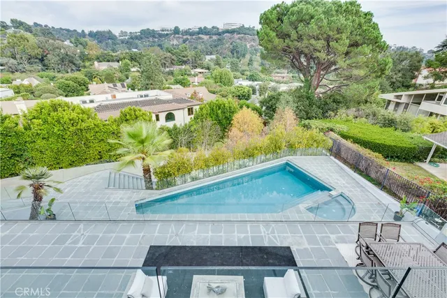 a view of a yard with an outdoor seating
