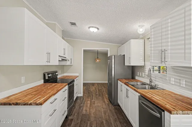 $209,000 | 110 Holiday Park Boulevard Northeast, Palm Bay, FL 32907