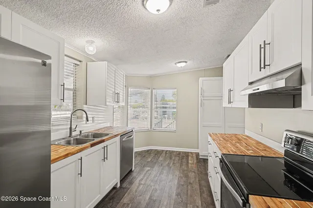 $209,000 | 110 Holiday Park Boulevard Northeast, Palm Bay, FL 32907