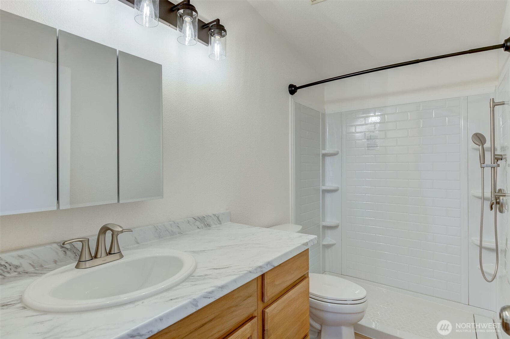 1200 Gallers Street Wenatchee, WA 98801 - Photo 16 of 27 a bathroom with a granite countertop sink toilet and shower
