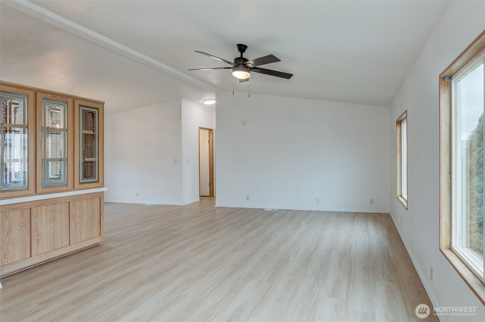 1200 Gallers Street Wenatchee, WA 98801 - Photo 3 of 27 wooden floor in an empty room with a window