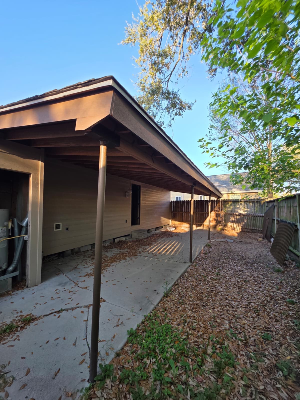 1720 Roxella Street Houston, TX 77093 - Photo 13 of 13 a house with trees in the background