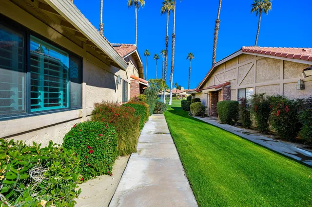 a view of a back yard of the house