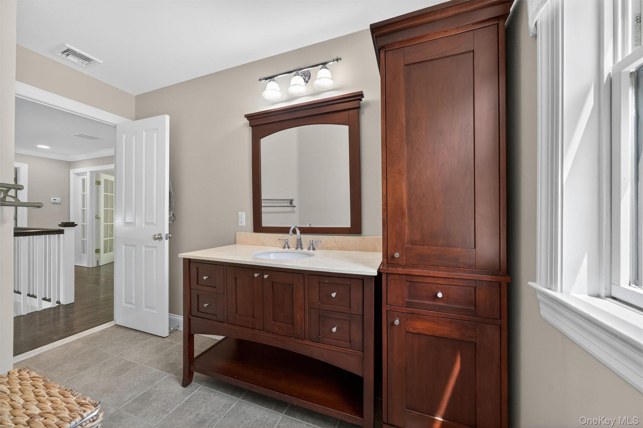 28 Bethlehem Road New Windsor, NY 12553 - Photo 44 of 50 a spacious bathroom with a double vanity sink and a mirror