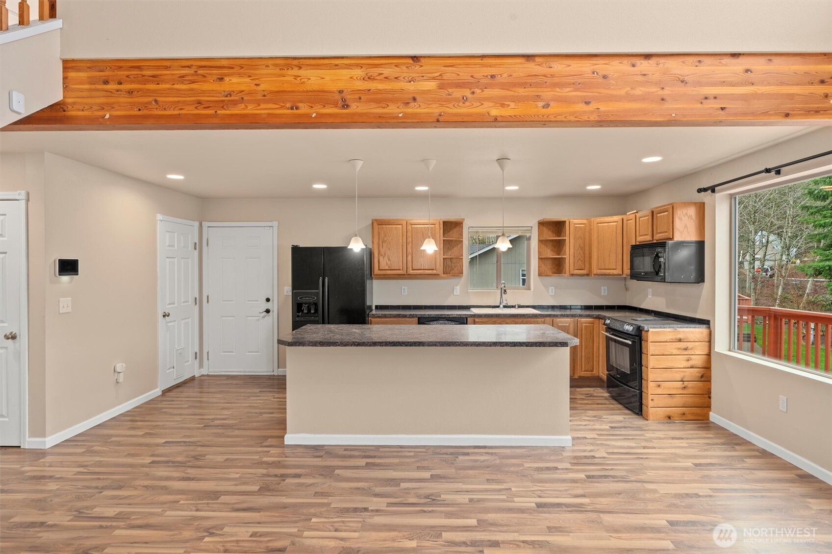 120 West Prairie Loop Road Elma, WA 98541 - Photo 11 of 40 a view of kitchen with stainless steel appliances granite countertop cabinets and outdoor space