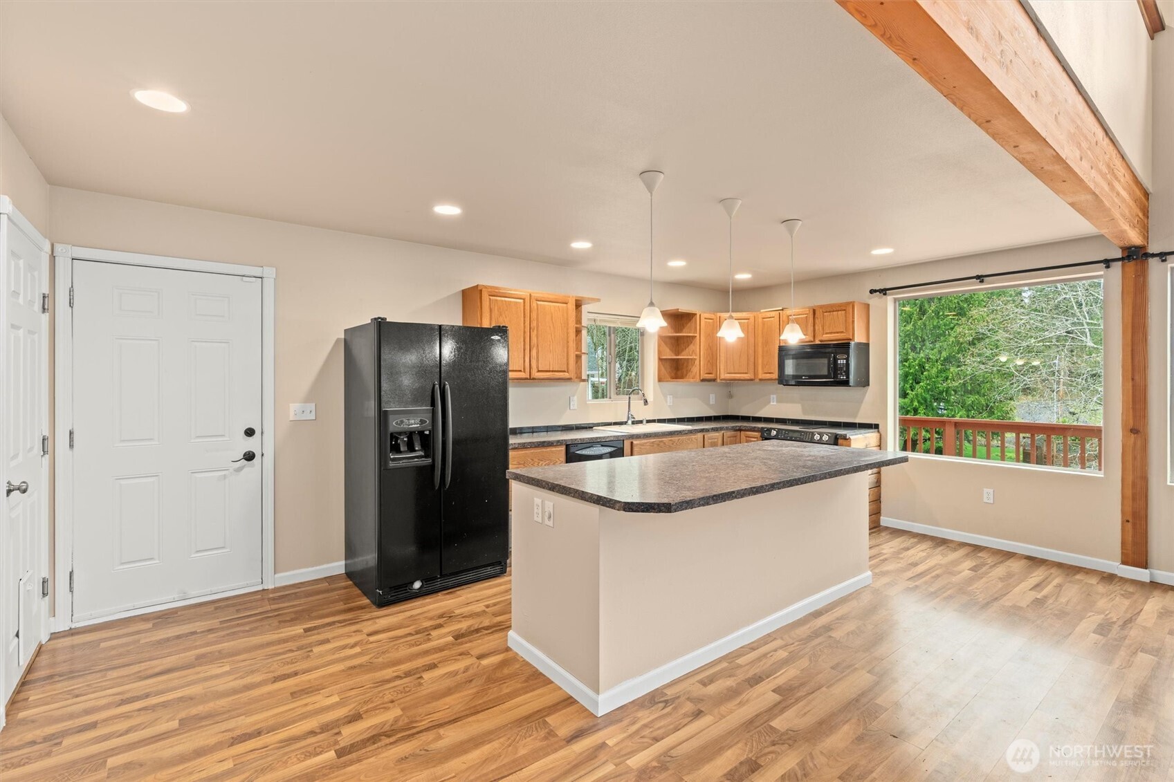 120 West Prairie Loop Road Elma, WA 98541 - Photo 13 of 40 a large kitchen with stainless steel appliances granite countertop a refrigerator and a sink