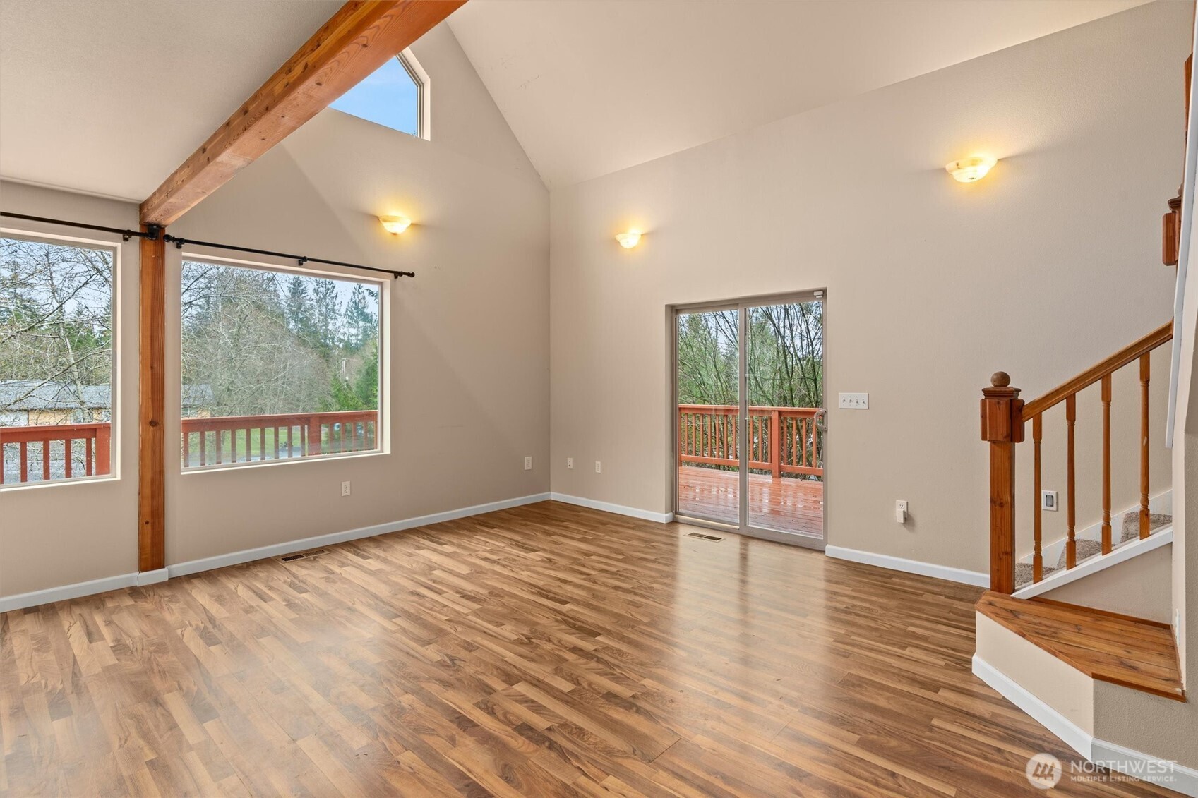 120 West Prairie Loop Road Elma, WA 98541 - Photo 16 of 40 a view of an empty room with wooden floor and a window