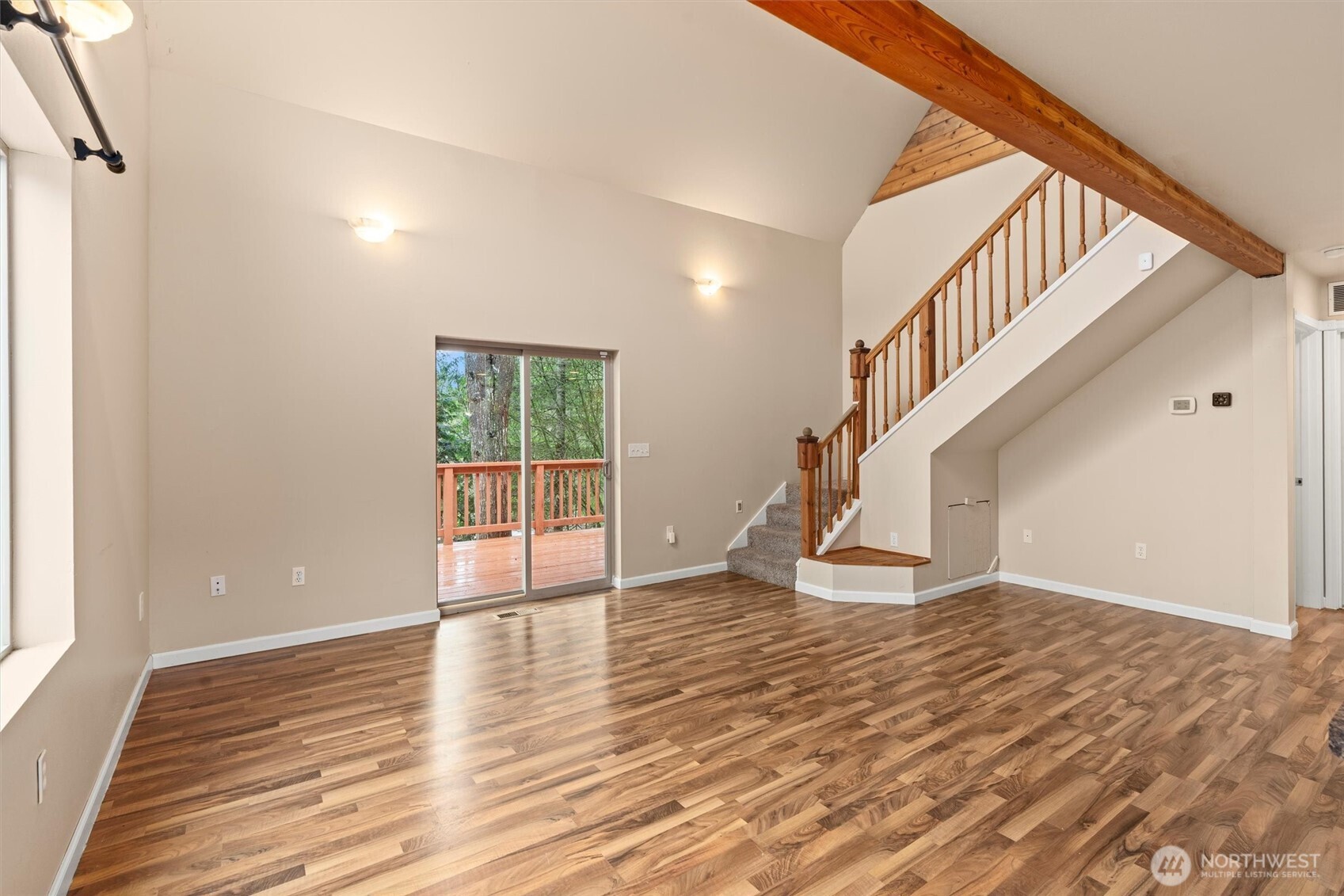 120 West Prairie Loop Road Elma, WA 98541 - Photo 17 of 40 a view of an empty room with wooden floor and stairs