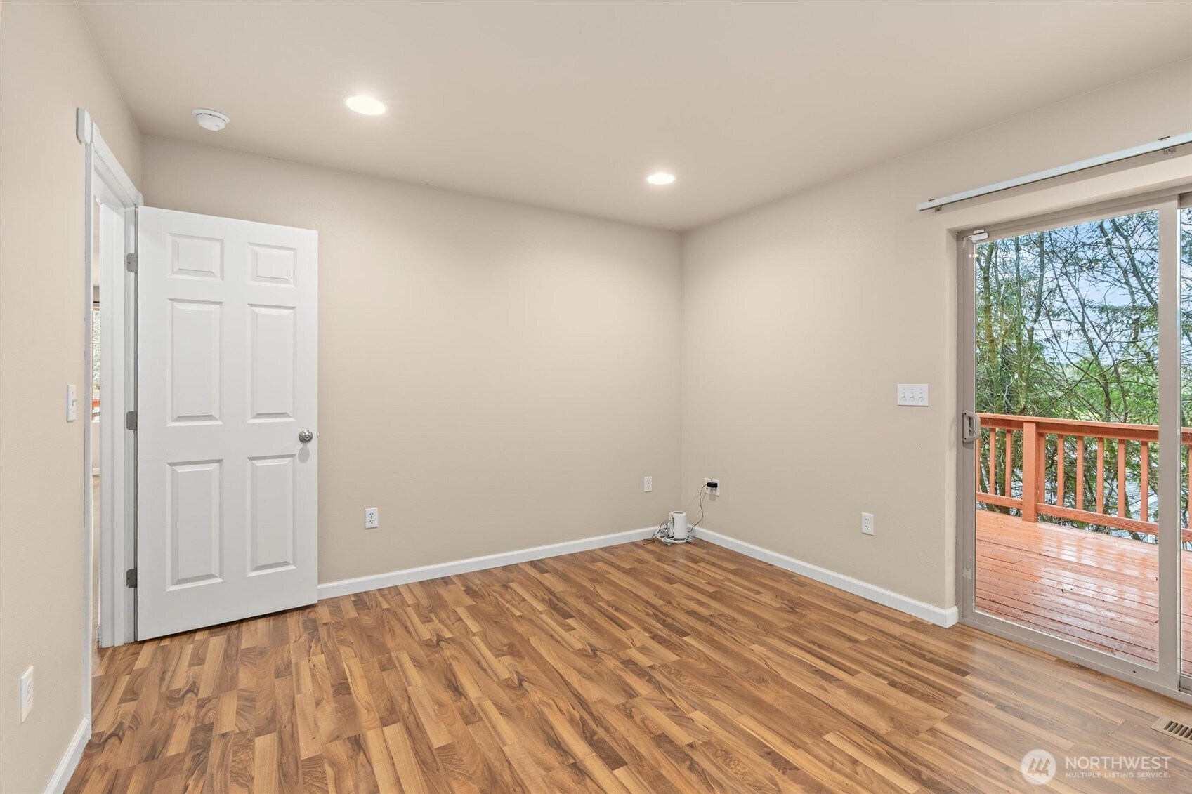 120 West Prairie Loop Road Elma, WA 98541 - Photo 21 of 40 a view of empty room with wooden floor and fan