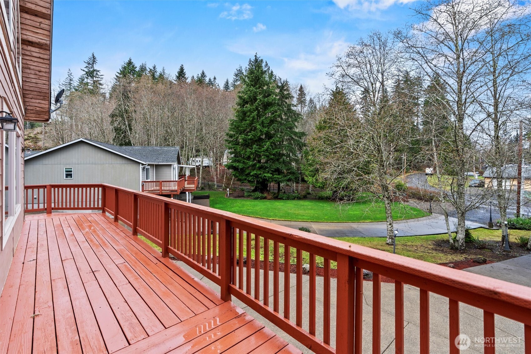 120 West Prairie Loop Road Elma, WA 98541 - Photo 7 of 40 a view of a wooden deck with a yard