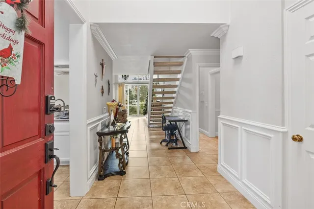 a kitchen with a sink stainless steel appliances and cabinets
