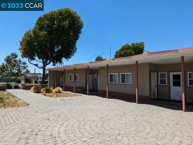 a front view of a house having yard