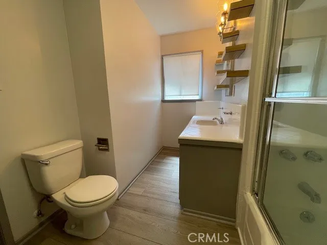 a bathroom with a sink and a toilet