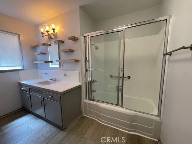 a bathroom with a sink and mirror