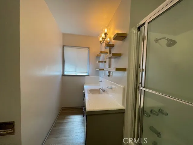 a bathroom with a sink and mirror