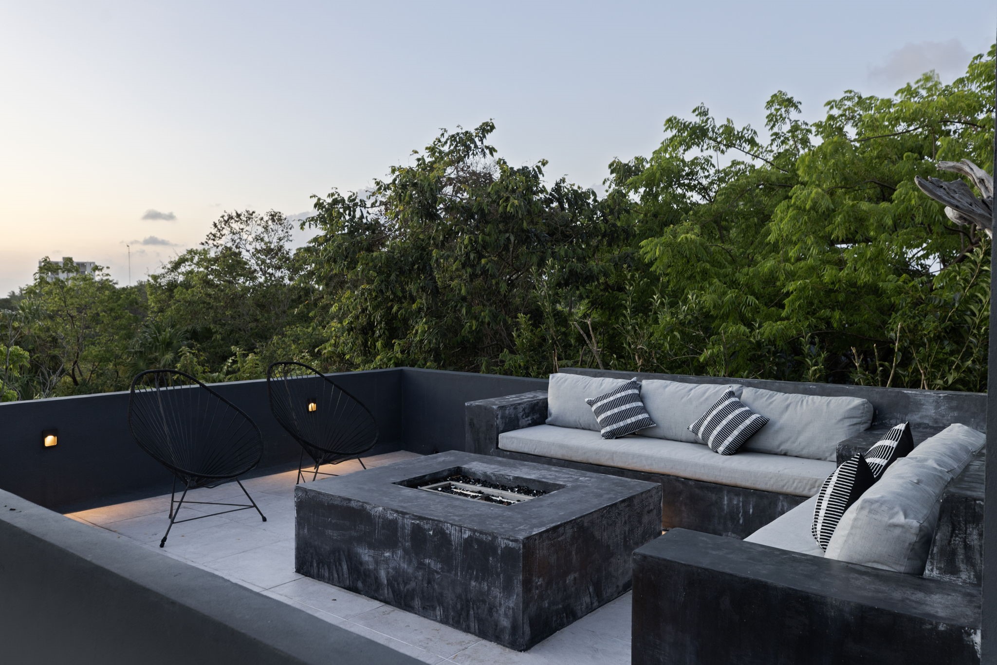 6 Country Club, Unit 4 Nome, TX 77629 - Photo 6 of 45 Take in breathtaking panoramic views of the lush Cozumel canopy from this ultra-private rooftop lounge designed for luxurious relaxation.