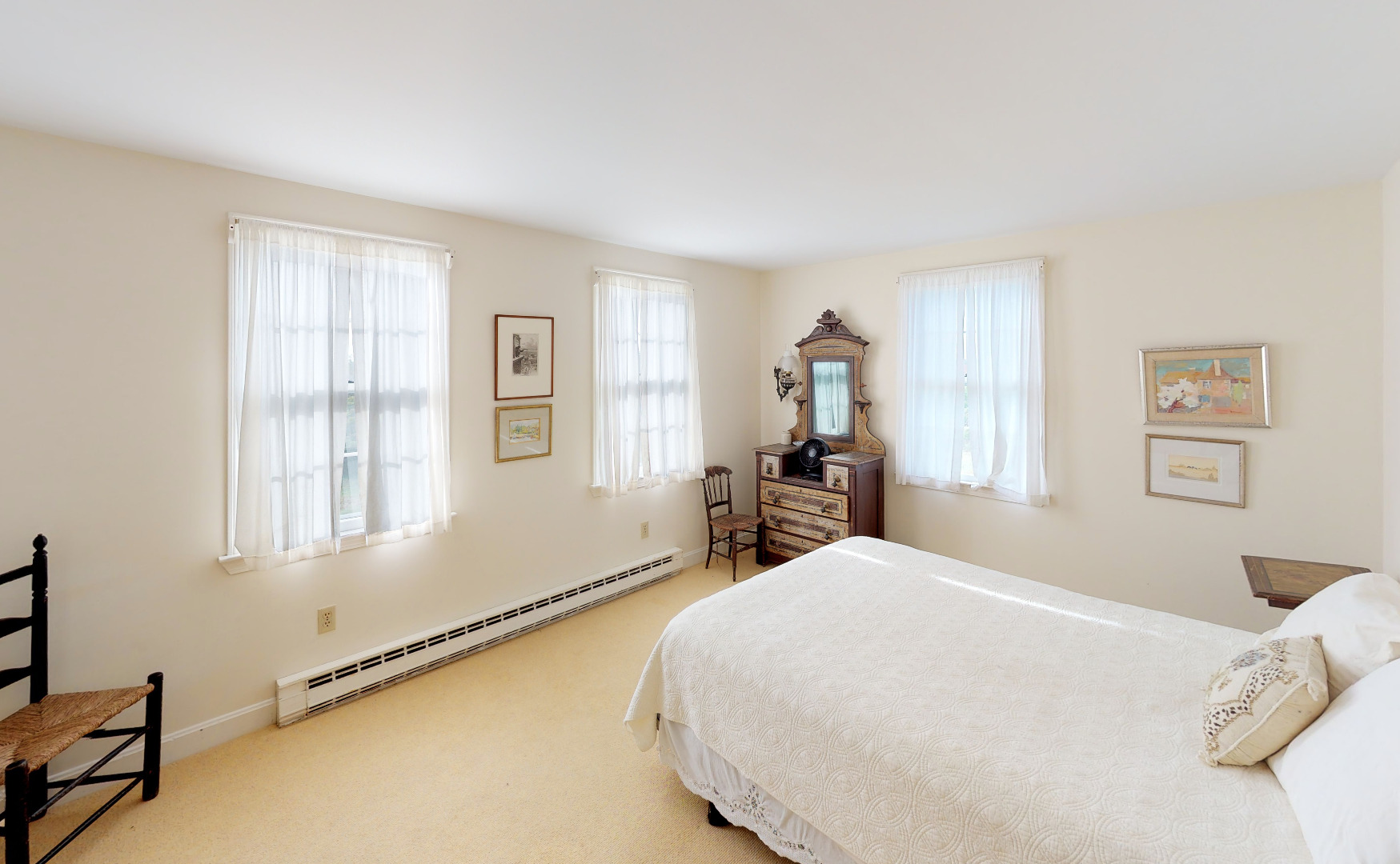 43 West Miacomet Road Nantucket, MA 02554 - Photo 20 of 22 a large white bed in a white room