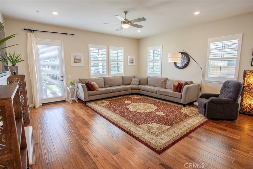 26424 Township Street Saugus, CA 91350 - Photo 18 of 72 a living room with furniture rug and wooden floor
