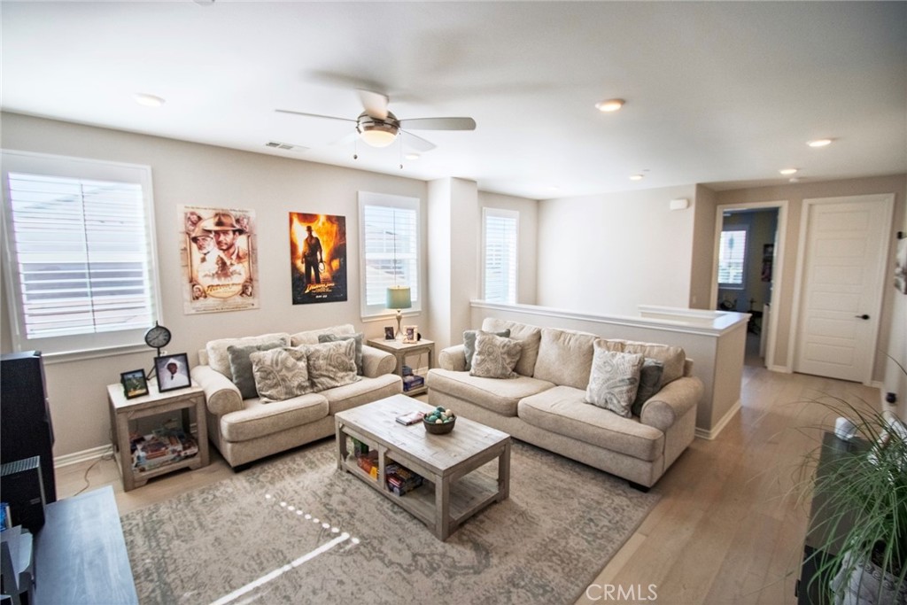 26424 Township Street Saugus, CA 91350 - Photo 33 of 72 a living room with furniture and a large window