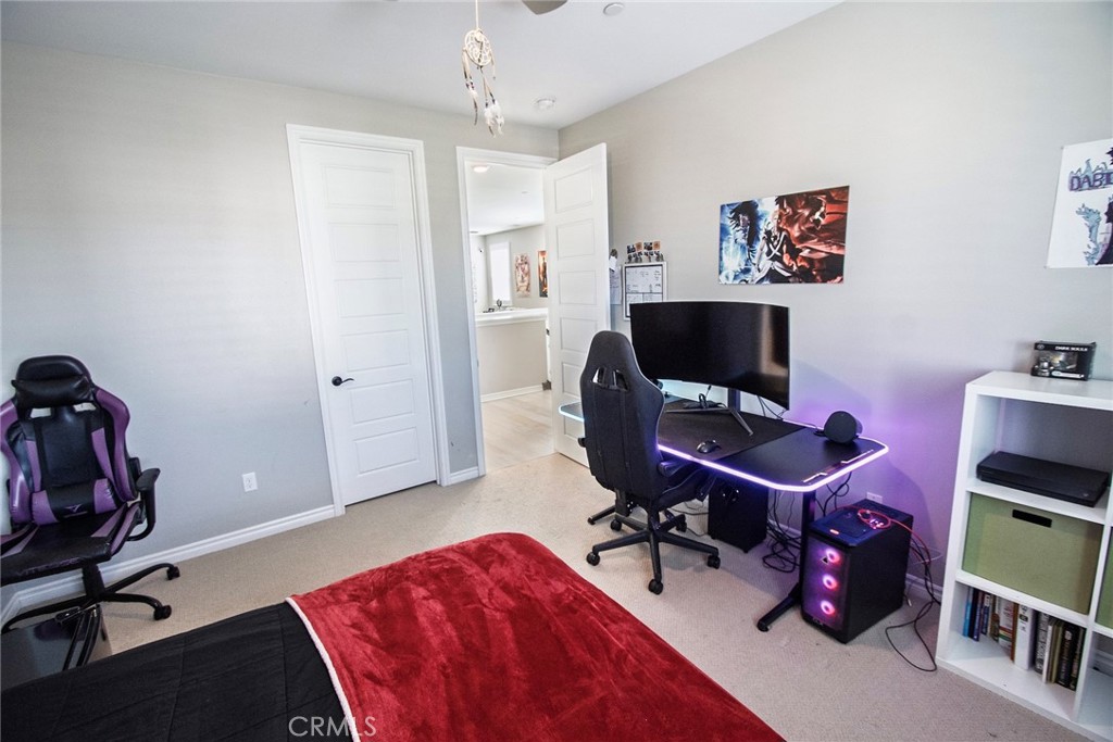 26424 Township Street Saugus, CA 91350 - Photo 40 of 72 a view of a workspace with furniture and a window