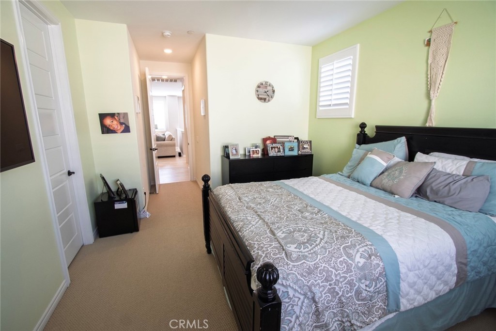 26424 Township Street Saugus, CA 91350 - Photo 43 of 72 a bedroom with a bed and a dresser