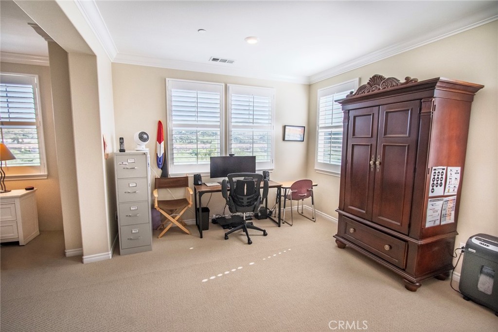 26424 Township Street Saugus, CA 91350 - Photo 49 of 72 a view of a workspace with furniture and a window