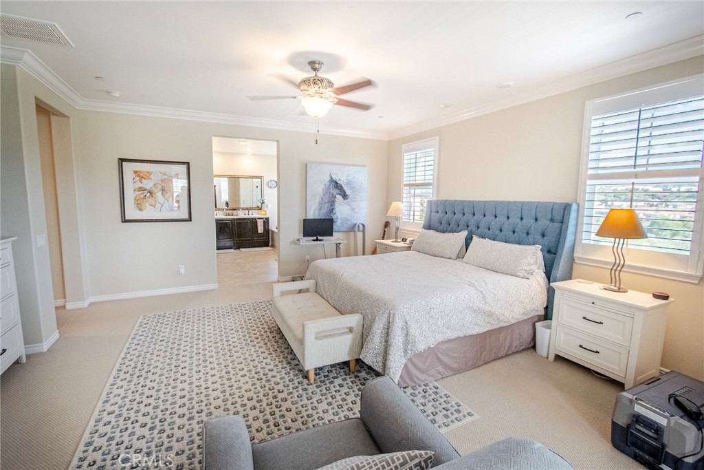 26424 Township Street Saugus, CA 91350 - Photo 51 of 72 a spacious bedroom with a bed and window