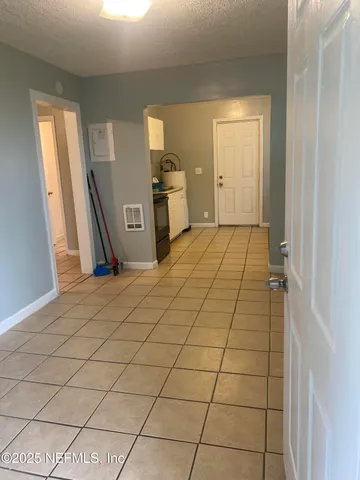 a view of a livingroom with furniture