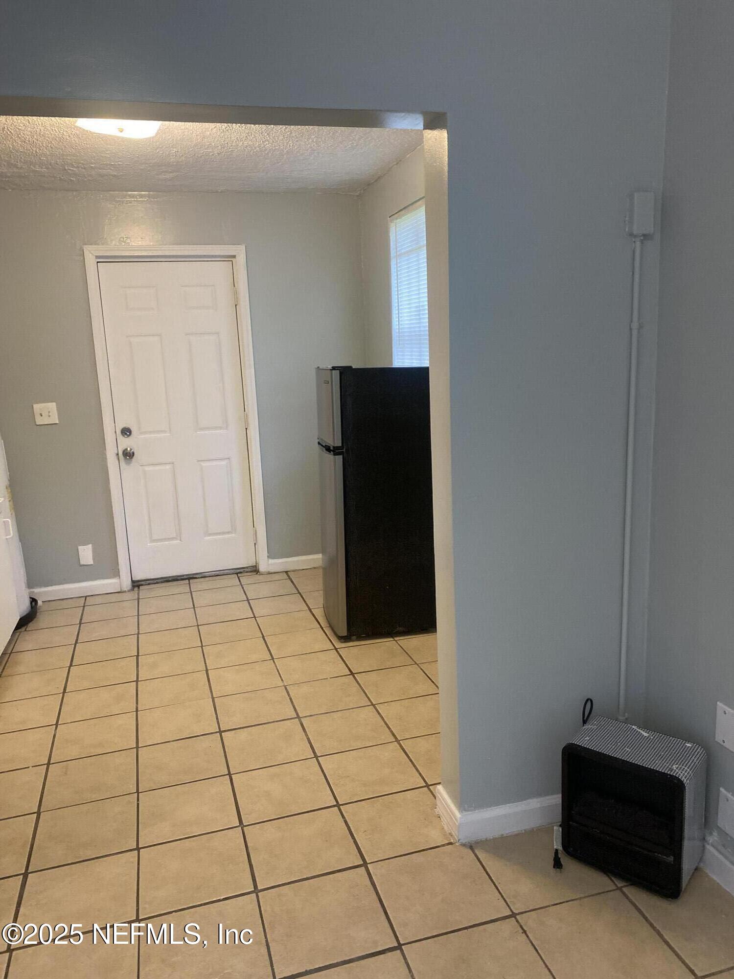 5754 Moncrief Road Jacksonville, FL 32209 - Photo 3 of 5 a view of an empty room