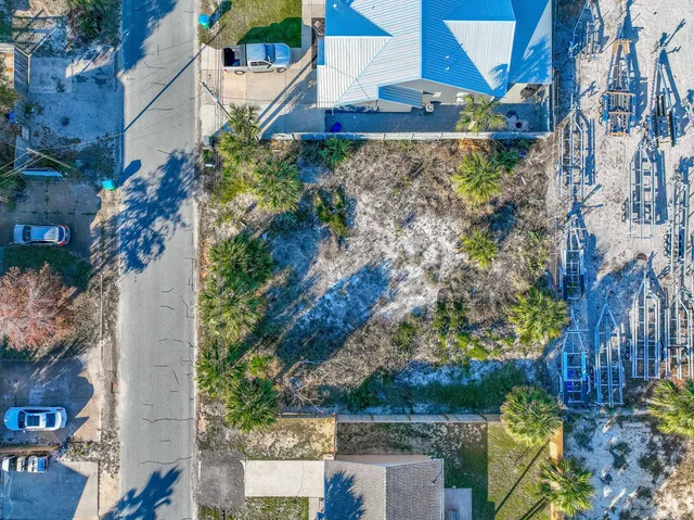 a aerial view of a house with a yard