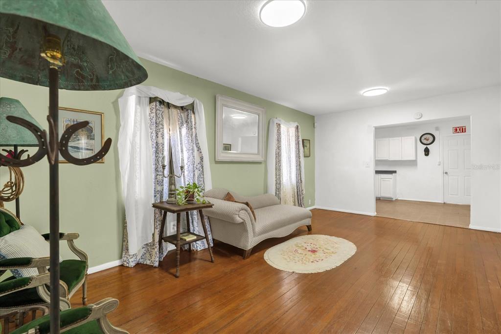 312 East Main Street Dundee, FL 33838 - Photo 6 of 27 a living room with furniture and wooden floor