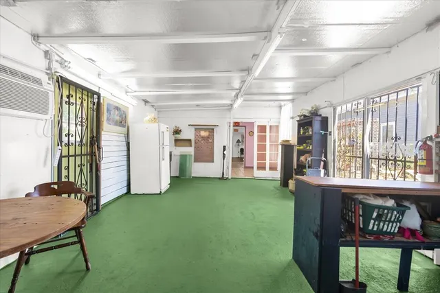 a view of a livingroom with furniture and a fireplace