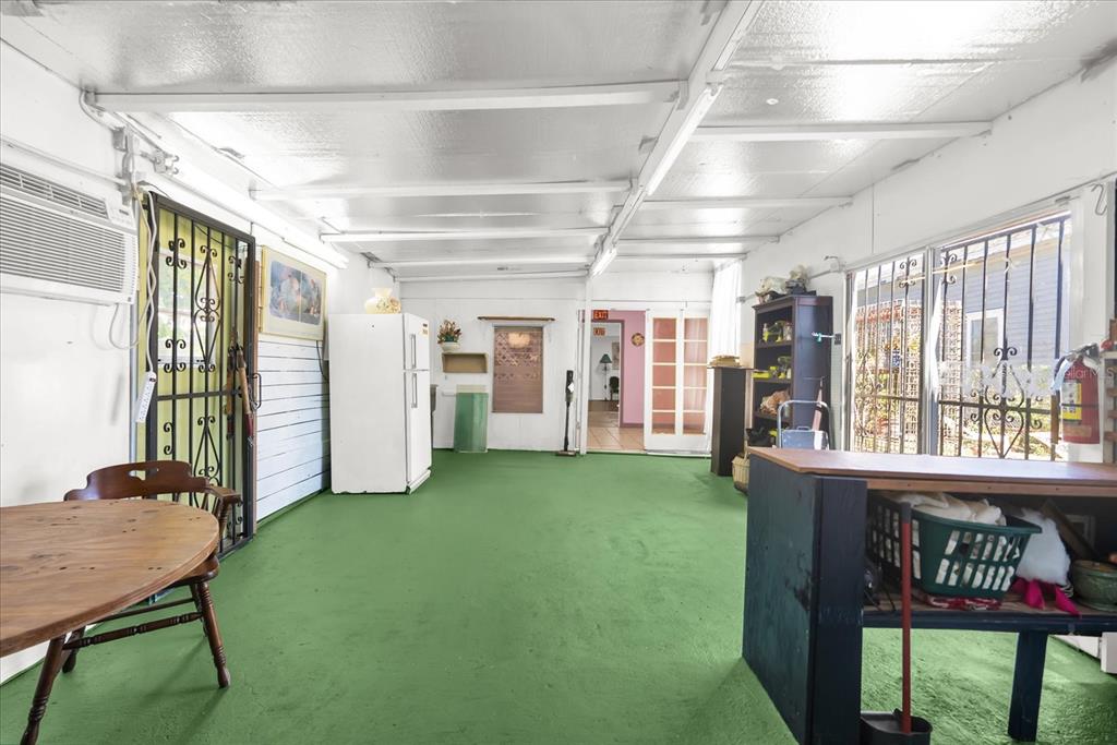 312 East Main Street Dundee, FL 33838 - Photo 9 of 27 a view of a room with furniture and a window