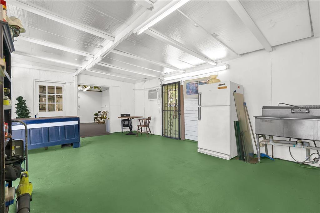 312 East Main Street Dundee, FL 33838 - Photo 10 of 27 a view of a livingroom with furniture and a fireplace