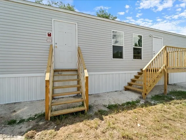 a view of a wooden fence