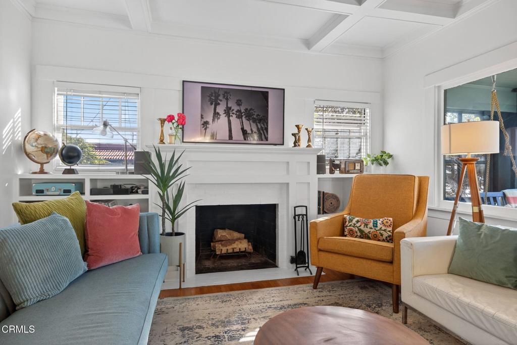 407 Magnolia Avenue Oxnard, CA 93030 - Photo 21 of 76 a living room with furniture and a fireplace