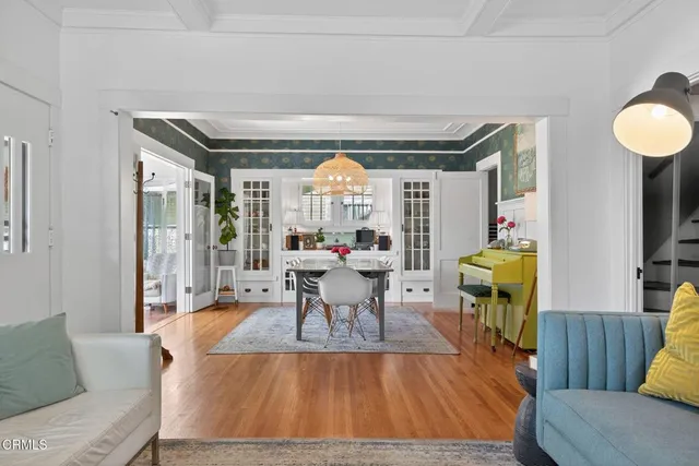 a stove top oven sitting inside of a kitchen