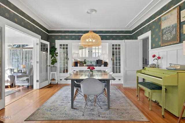a bedroom with a bed and a book shelf