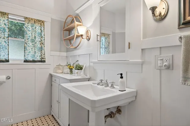 a view of a chairs and table in the patio