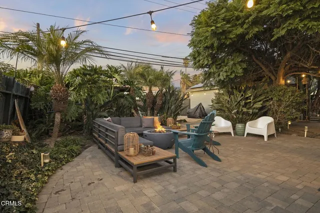 a front view of a house with a small yard